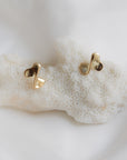 gouden oorknopjes